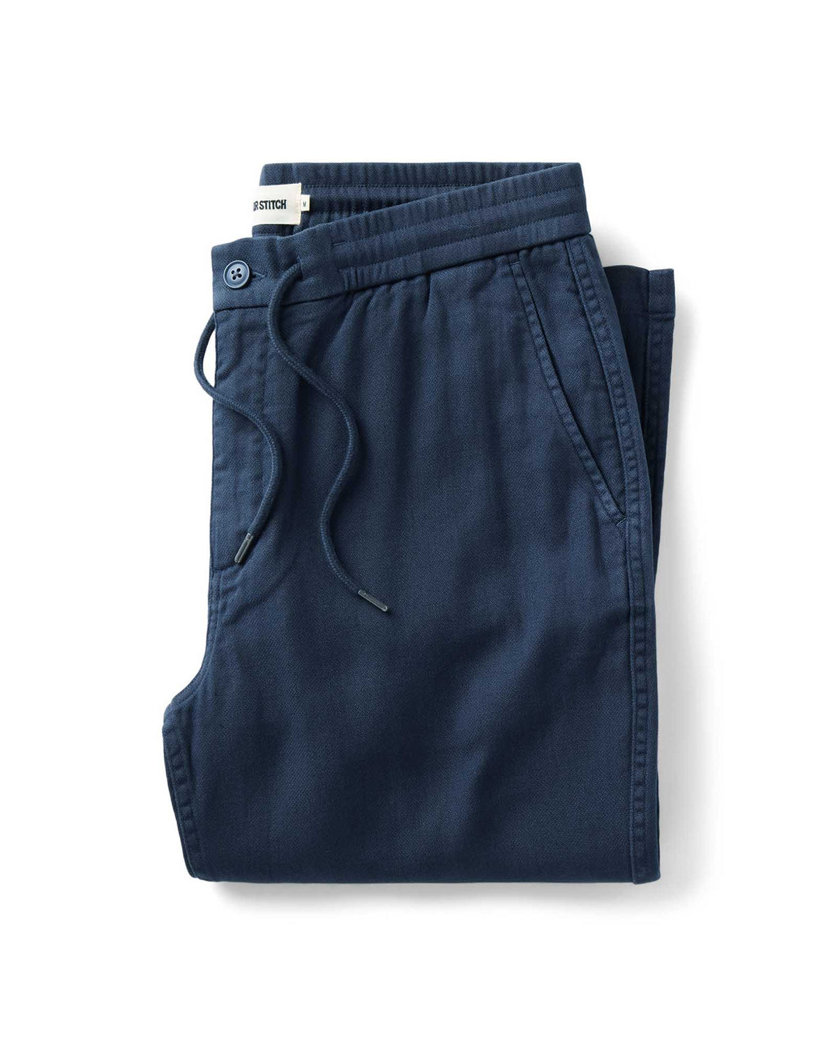 instock_m_q226_roamer-pant-in-fatigue-navy-broken-twill_portrait_001